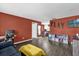 View from living area into the kitchen and a play area, creating an open atmosphere at 4959 Ardmore Dr, Winter Park, FL 32792