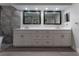 Bathroom featuring a modern vanity with dual sinks and a luxurious freestanding tub at 6019 Crystal View Dr, Orlando, FL 32819