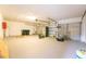 Spacious three car garage with ample storage space and modern doors at 6019 Crystal View Dr, Orlando, FL 32819