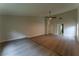 Bright living room with vaulted ceilings, modern lighting, and wood-style floors at 6019 Crystal View Dr, Orlando, FL 32819