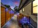The backyard features a charming stone path, complementing the home's exterior at 6805 Barby Ln, Belle Isle, FL 32812