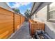 The backyard features a charming stone path, complementing the home's exterior at 6805 Barby Ln, Belle Isle, FL 32812