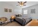 Cozy bedroom with warm lighting, stylish decor, and a comfortable bed at 6805 Barby Ln, Belle Isle, FL 32812