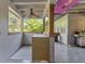A view of outdoor kitchen with sink and storage, ideal for entertaining at 6805 Barby Ln, Belle Isle, FL 32812