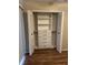 Bedroom closet featuring multiple drawers and shelving for optimal storage at 7266 Oak Meadows Cir, Orlando, FL 32835