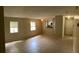 Spacious living room featuring tile flooring, natural light from windows, and neutral paint at 7266 Oak Meadows Cir, Orlando, FL 32835