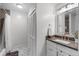 Bright bathroom featuring a shower-tub combination, closet, and a vanity with countertop and mirror at 7742 Sugar Bend Dr # 7742, Orlando, FL 32819