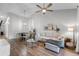 Bright living room with hardwood floors, comfortable seating, and tasteful decor at 7742 Sugar Bend Dr # 7742, Orlando, FL 32819