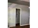 Bedroom with a closet featuring sliding doors, and neutral colored walls and flooring at 7924 Bridgestone Dr, Orlando, FL 32835