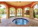 Inviting hot tub in a community setting, perfect for relaxation and enjoying the outdoors at 835 Grand Regency Pt # 104, Altamonte Springs, FL 32714