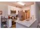 Well-equipped kitchen featuring white cabinetry, stainless steel appliances, and granite countertops at 835 Grand Regency Pt # 104, Altamonte Springs, FL 32714