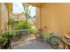 Screened patio provides an inviting view and a charming bicycle at 835 Grand Regency Pt # 104, Altamonte Springs, FL 32714