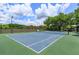 Well-maintained community tennis court, providing residents a space for recreational activities and exercise at 835 Grand Regency Pt # 104, Altamonte Springs, FL 32714