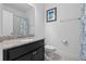 Bathroom featuring a vanity, granite countertop, and a bathtub at 9591 Amber Chestnut Way, Winter Garden, FL 34787