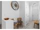 Bright entryway with tile flooring, stylish decor, and a coat closet at 9591 Amber Chestnut Way, Winter Garden, FL 34787