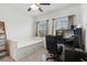 Well lit office featuring natural light from the windows and carpeted floors at 9591 Amber Chestnut Way, Winter Garden, FL 34787