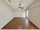 Serene bedroom with tile flooring, ceiling fan, and a large window for natural light at 14014 Spruce Creek Ln, Orlando, FL 32828