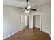 Bedroom with ceiling fan, tiled floor, closet, and white trim at 14014 Spruce Creek Ln, Orlando, FL 32828