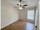 Bedroom featuring a window, ceiling fan, and tiled floors at 14014 Spruce Creek Ln, Orlando, FL 32828