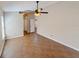 Bedroom featuring tile flooring, a ceiling fan, and ample natural light at 14014 Spruce Creek Ln, Orlando, FL 32828