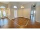 Inviting living area featuring a large window, decorative lighting, and a neutral color palette at 14014 Spruce Creek Ln, Orlando, FL 32828