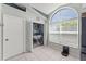 Functional laundry area with modern machines, storage, and natural light at 10064 River Glen Ct, Orlando, FL 32825