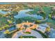 Exclusive golf community with a luxurious clubhouse, surrounded by lush landscaping and picturesque water features at 10630 Mobberley Cir, Orlando, FL 32832