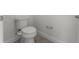 Powder room featuring a standard toilet with white wall paint at 10630 Mobberley Cir, Orlando, FL 32832