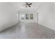Spacious bedroom with recessed lighting, ceiling fan, and tile flooring at 10630 Mobberley Cir, Orlando, FL 32832