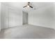 Bedroom features carpet flooring, ceiling fan and white paint at 10630 Mobberley Cir, Orlando, FL 32832