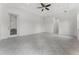 Bright bedroom featuring tile flooring, recessed lights, and a ceiling fan at 10630 Mobberley Cir, Orlando, FL 32832