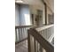 Inviting balcony area featuring unit 116 with wood railings at 116 Palm View Ct # 3535/6, Haines City, FL 33844