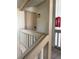 Exterior shot of balcony and unit doorway with exterior light fixture and fire extinguisher at 116 Palm View Ct # 3535/6, Haines City, FL 33844