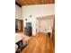 Open bedroom with wood floors, an ensuite bath and a large walk-in closet at 116 Palm View Ct # 3535/6, Haines City, FL 33844