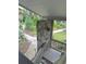 Charming exterior view featuring a stone pillar and landscaped walkways at 116 Palm View Ct # 3535/6, Haines City, FL 33844