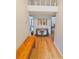 Welcoming foyer with hardwood floors and decorative bench at 116 Palm View Ct # 3535/6, Haines City, FL 33844
