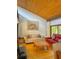 Cozy living room featuring vaulted wood ceilings and lots of light at 116 Palm View Ct # 3535/6, Haines City, FL 33844