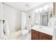 Clean bathroom featuring a shower-tub combo, vanity, and a large mirror at 1166 Carmel Cir # 120, Casselberry, FL 32707