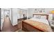 Bedroom featuring hardwood floors, a closet, and neutral paint, providing a relaxing retreat at 1166 Carmel Cir # 120, Casselberry, FL 32707
