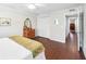Bedroom with hardwood floors, a closet, and neutral paint, providing a relaxing retreat at 1166 Carmel Cir # 120, Casselberry, FL 32707