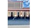 Well lit carport with black asphalt and white parking lines, easy access to building storage at 1166 Carmel Cir # 120, Casselberry, FL 32707