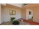 Inviting condo entrance with stone bench, plants, and decorative gravel at 1166 Carmel Cir # 120, Casselberry, FL 32707