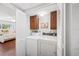 Functional laundry room with a side-by-side washer and dryer, convenient storage, and easy access at 1166 Carmel Cir # 120, Casselberry, FL 32707