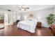 Comfortable main bedroom with hardwood floors, mirrored closet doors, and a relaxing ambiance at 1166 Carmel Cir # 120, Casselberry, FL 32707