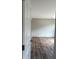 Spacious bedroom featuring pristine walls, modern flooring and a well-lit ambiance at 1349 Nw 109 Ave, Ocala, FL 34482