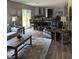 Open-concept living space with modern furniture, and adjoined kitchen create a roomy layout at 1349 Nw 109 Ave, Ocala, FL 34482