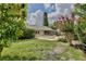 The home has a patio and a small spa-like water feature, and a screened-in porch at 14063 Ithaca Way, Orlando, FL 32826