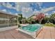 This home has a backyard with patio, above ground pool, and screened in porch at 14063 Ithaca Way, Orlando, FL 32826