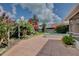 Lush backyard with patio and small spa-like water feature and mature landscaping at 14063 Ithaca Way, Orlando, FL 32826