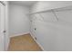 Walk-in closet with tile floors, white walls, and wire shelving for optimal storage space at 142 E 9Th St, Chuluota, FL 32766